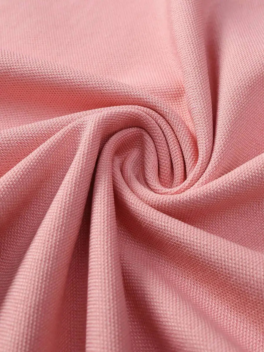 Pink Short-Sleeve Polo Shirt with Contrast Collar and Embroidered Text Design