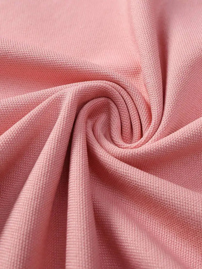 Pink Short-Sleeve Polo Shirt with Contrast Collar and Embroidered Text Design