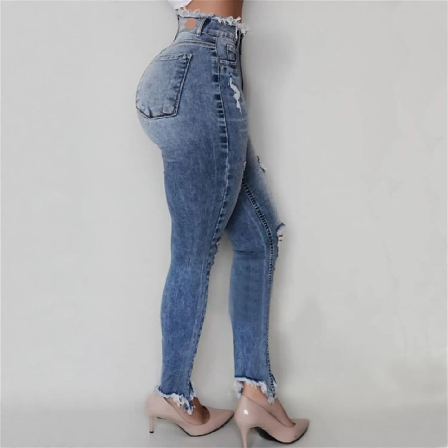 Women's high waisted fringed ripped jeans with irregular edges, slim fit and tight fitting style