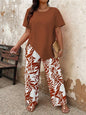 2pcs Plus Size Women Solid Asymmetric Hem Top & Tropical Plants Print Pants