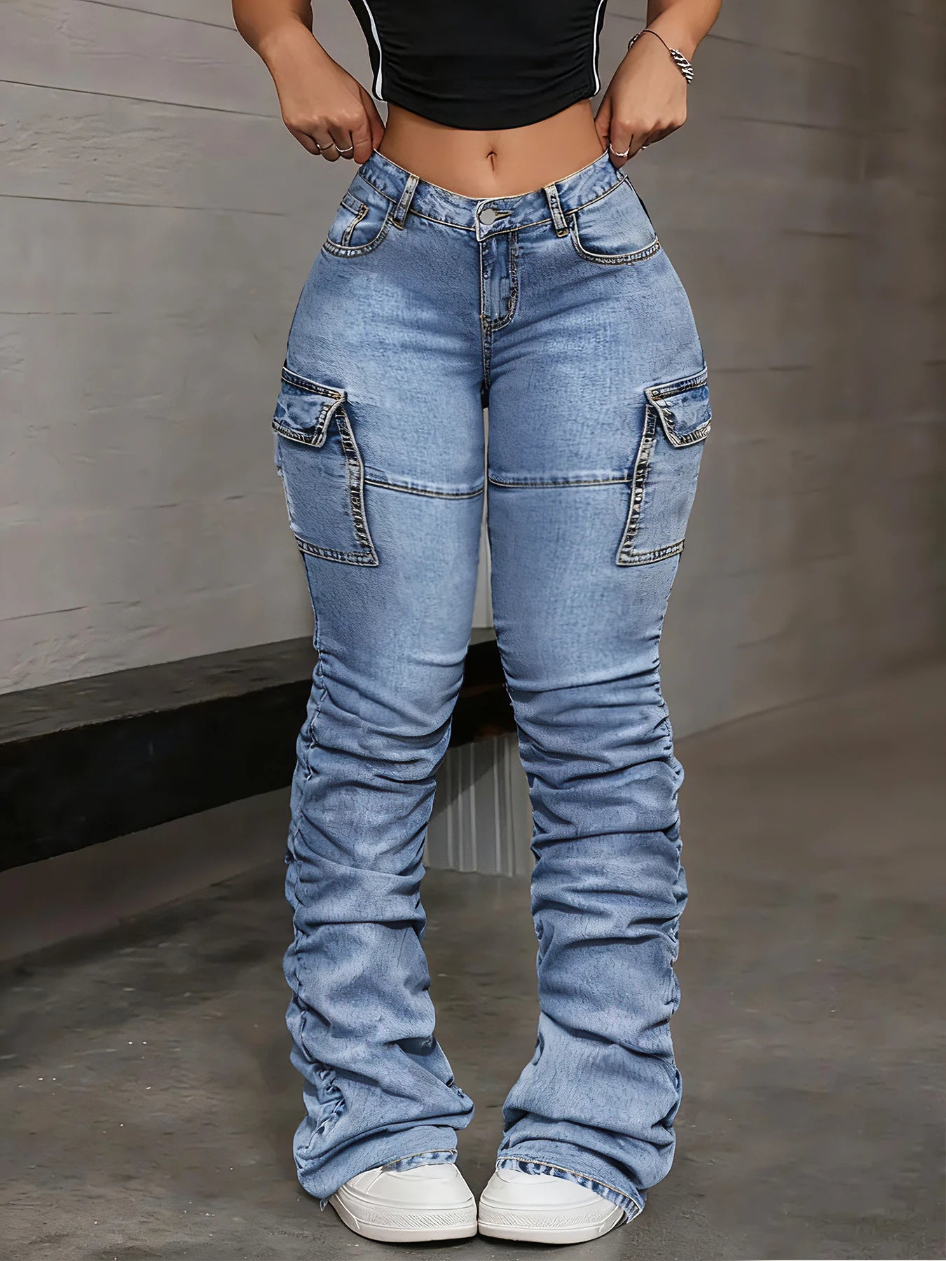 Plus-size women's high-waisted jeans, stylish and leg-lengthening, comfortable light blue cargo pocket flared pants.