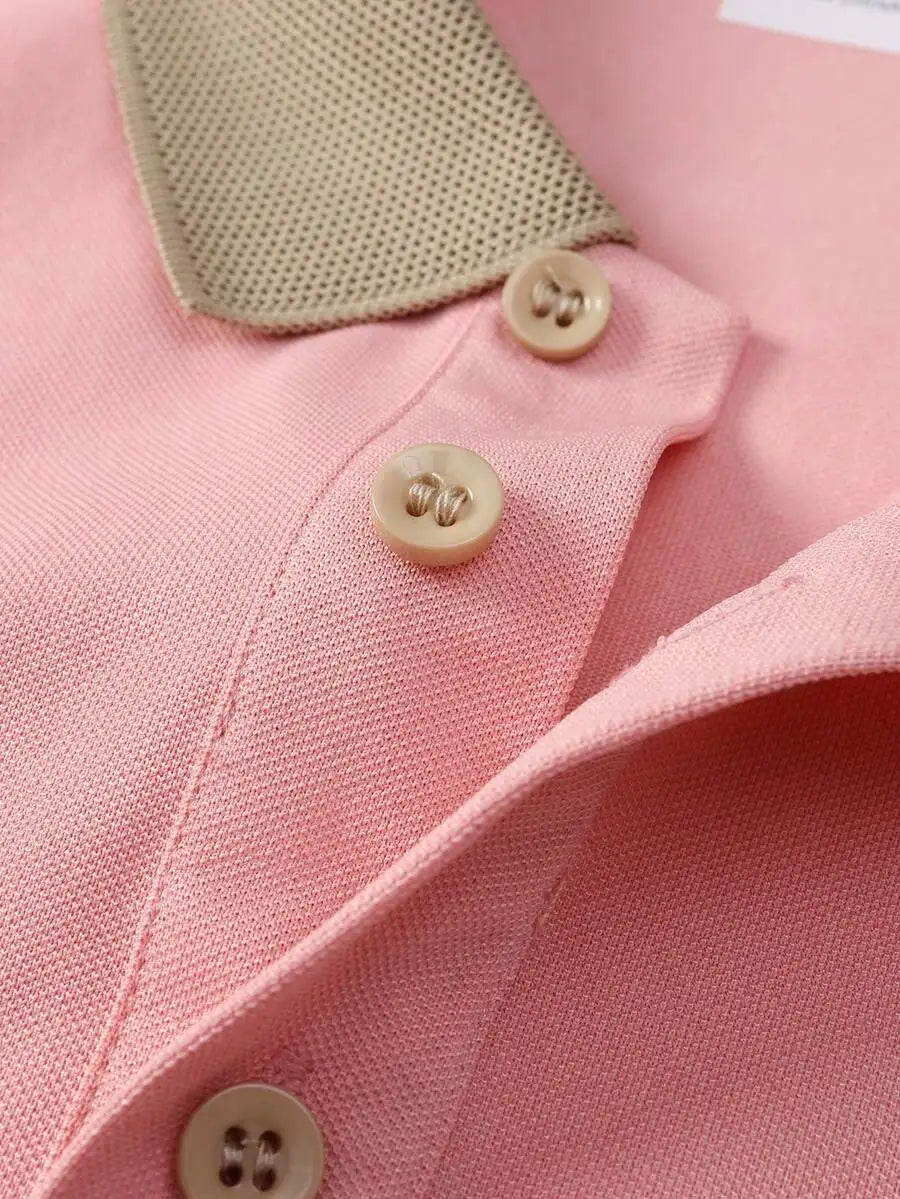 Pink Short-Sleeve Polo Shirt with Contrast Collar and Embroidered Text Design