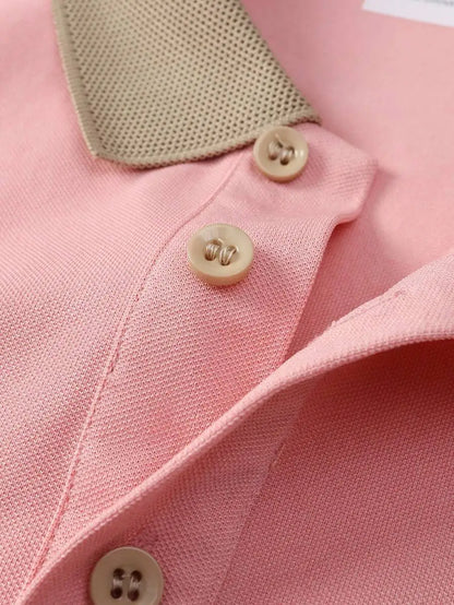 Pink Short-Sleeve Polo Shirt with Contrast Collar and Embroidered Text Design