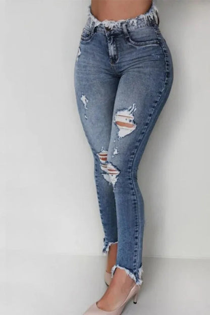 Women's high waisted fringed ripped jeans with irregular edges, slim fit and tight fitting style