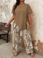 2pcs Plus Size Women Solid Asymmetric Hem Top & Tropical Plants Print Pants